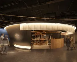 パース図：出店している店舗の外観図。ラーメンどんぶりのような円形の建物で、入口横から数メートルは外の通路から覗けるくらいの高さの壁になっている。入口側から半分くらいは天井にのれんがかかっている。